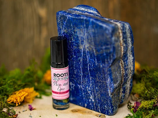 “PURE AND OPEN” CRYSTAL AND HERBAL INFUSED ROLLER